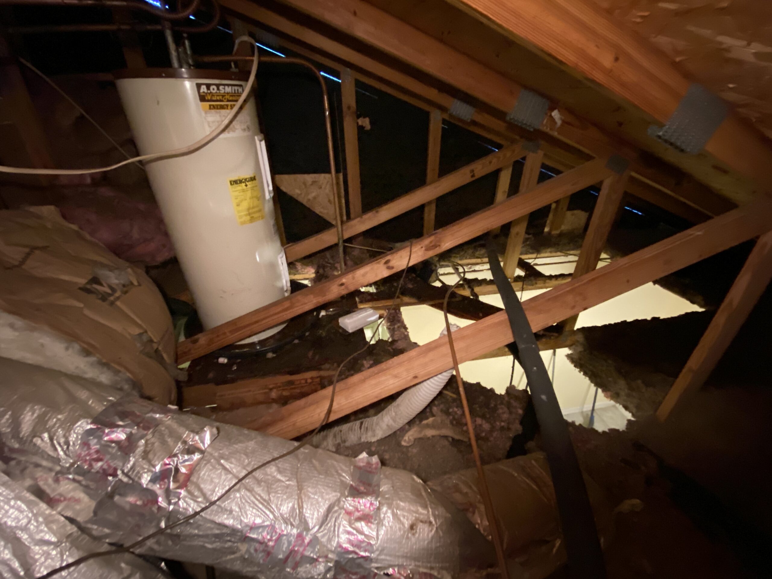 Why is the hot water heater in the attic? – Drew Piers